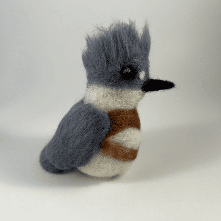 A needle-felted belted kingfisher borb faces directly to the right.