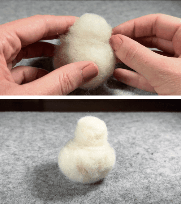 The top half of the image shows two partially obscured hands wrapping some soft wool roving around the neck of the borb base, which is the space between the smaller ball and the larger ball. The bottom half of the image shows the borb which has had its neck smoothed, sitting upright on a grey felting mat.