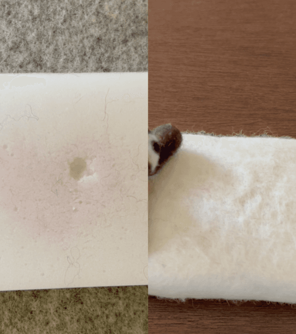 On the left, an inlay shows a close up of a small foam felting block that shows wear: there are fibers stuck in it, and a circular piece of foam is missing from it. On the right, an inlay shows a close up of a wool fiber felting mat which has a few stray fibers in it but is mostly white and clean.