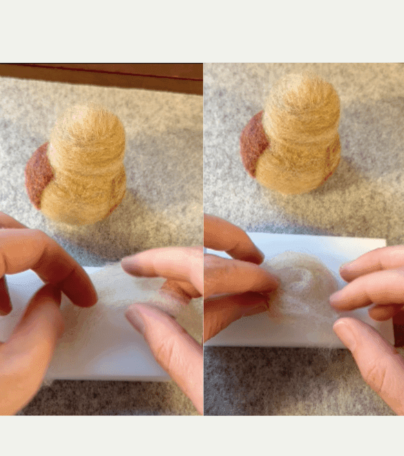 On the left side of the image, two partially obscured hands stretch light colored felting wool in an arc shape over a felting pad. On the left side, the left hand pinches the wool while the right hand shapes it into a circle.