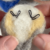 Decorative screen capture of How to create borb feets from wire tutorial video.